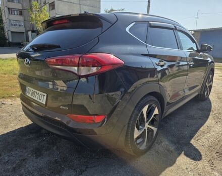 Чорний Хендай Туксон, об'ємом двигуна 2 л та пробігом 110 тис. км за 18700 $, фото 5 на Automoto.ua