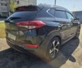 Чорний Хендай Туксон, об'ємом двигуна 2 л та пробігом 110 тис. км за 18700 $, фото 5 на Automoto.ua