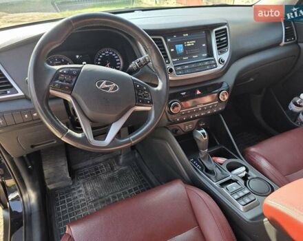 Черный Хендай Туксон, объемом двигателя 1.98 л и пробегом 112 тыс. км за 18300 $, фото 9 на Automoto.ua