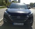 Черный Хендай Туксон, объемом двигателя 2 л и пробегом 44 тыс. км за 20500 $, фото 1 на Automoto.ua