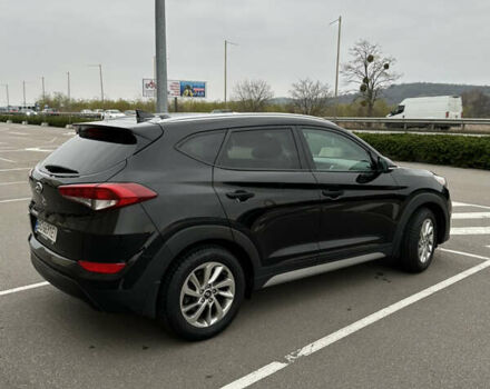 Черный Хендай Туксон, объемом двигателя 2 л и пробегом 120 тыс. км за 17800 $, фото 8 на Automoto.ua