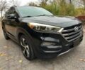 Черный Хендай Туксон, объемом двигателя 1.6 л и пробегом 74 тыс. км за 6500 $, фото 1 на Automoto.ua
