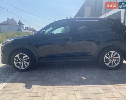 Черный Хендай Туксон, объемом двигателя 2 л и пробегом 126 тыс. км за 14500 $, фото 3 на Automoto.ua