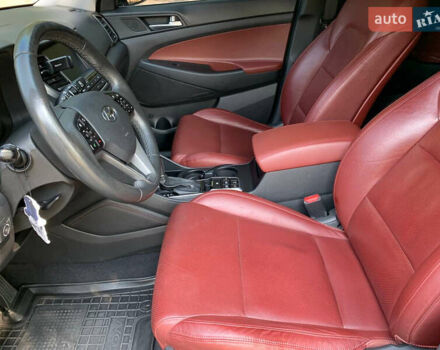 Черный Хендай Туксон, объемом двигателя 2 л и пробегом 122 тыс. км за 19800 $, фото 12 на Automoto.ua