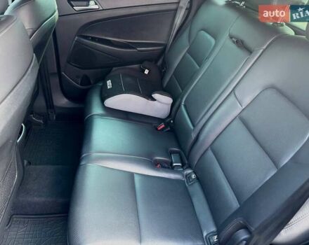 Черный Хендай Туксон, объемом двигателя 2 л и пробегом 98 тыс. км за 24000 $, фото 20 на Automoto.ua