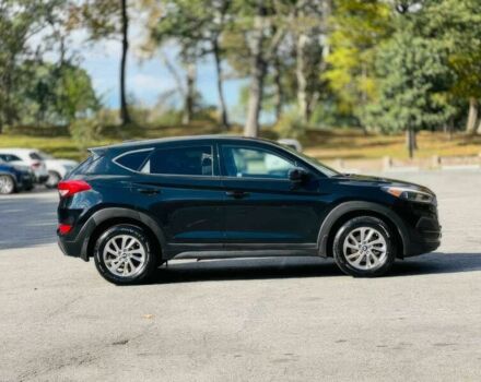 Черный Хендай Туксон, объемом двигателя 2 л и пробегом 60 тыс. км за 13500 $, фото 3 на Automoto.ua