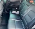 Черный Хендай Туксон, объемом двигателя 2 л и пробегом 98 тыс. км за 24000 $, фото 20 на Automoto.ua
