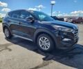 Черный Хендай Туксон, объемом двигателя 2 л и пробегом 70 тыс. км за 12500 $, фото 1 на Automoto.ua