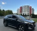 Черный Хендай Туксон, объемом двигателя 2 л и пробегом 148 тыс. км за 19500 $, фото 5 на Automoto.ua