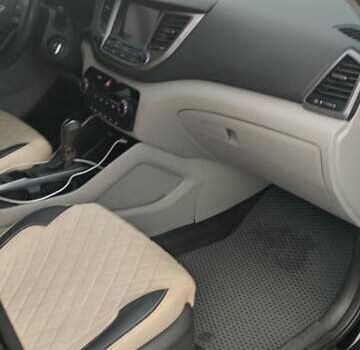 Чорний Хендай Туксон, об'ємом двигуна 2 л та пробігом 143 тис. км за 18000 $, фото 11 на Automoto.ua