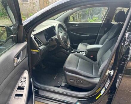 Черный Хендай Туксон, объемом двигателя 2 л и пробегом 83 тыс. км за 4400 $, фото 8 на Automoto.ua