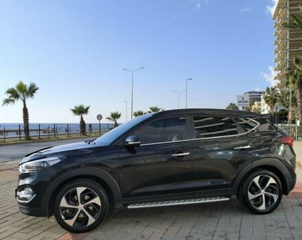 Черный Хендай Туксон, объемом двигателя 2 л и пробегом 120 тыс. км за 21000 $, фото 13 на Automoto.ua