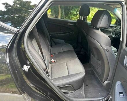 Черный Хендай Туксон, объемом двигателя 2 л и пробегом 83 тыс. км за 4400 $, фото 12 на Automoto.ua