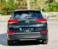 Черный Хендай Туксон, объемом двигателя 2 л и пробегом 60 тыс. км за 13500 $, фото 6 на Automoto.ua