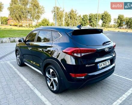 Черный Хендай Туксон, объемом двигателя 2 л и пробегом 98 тыс. км за 24000 $, фото 7 на Automoto.ua