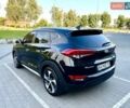 Черный Хендай Туксон, объемом двигателя 2 л и пробегом 98 тыс. км за 24000 $, фото 7 на Automoto.ua