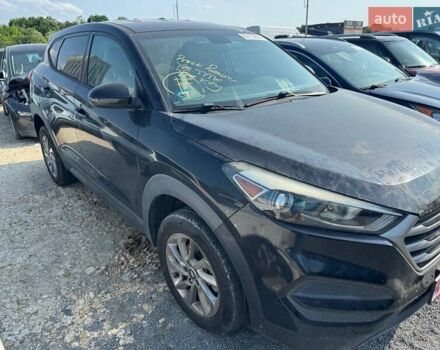 Чорний Хендай Туксон, об'ємом двигуна 2 л та пробігом 119 тис. км за 11700 $, фото 2 на Automoto.ua