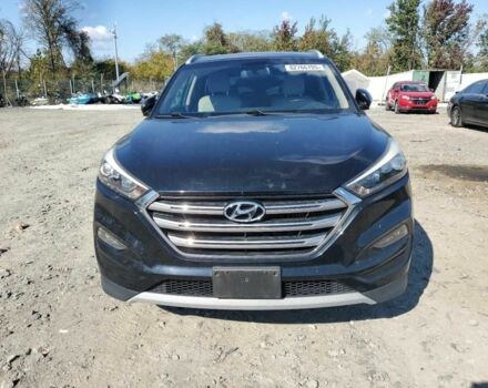 Черный Хендай Туксон, объемом двигателя 1.6 л и пробегом 157 тыс. км за 2600 $, фото 4 на Automoto.ua