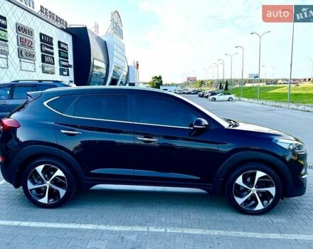 Черный Хендай Туксон, объемом двигателя 2 л и пробегом 98 тыс. км за 24000 $, фото 10 на Automoto.ua