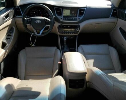 Черный Хендай Туксон, объемом двигателя 1.6 л и пробегом 157 тыс. км за 2600 $, фото 7 на Automoto.ua