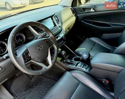 Черный Хендай Туксон, объемом двигателя 2 л и пробегом 98 тыс. км за 24000 $, фото 23 на Automoto.ua