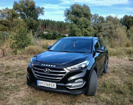 Чорний Хендай Туксон, об'ємом двигуна 2 л та пробігом 148 тис. км за 17800 $, фото 3 на Automoto.ua