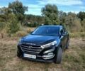 Чорний Хендай Туксон, об'ємом двигуна 2 л та пробігом 148 тис. км за 17800 $, фото 3 на Automoto.ua