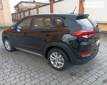 Черный Хендай Туксон, объемом двигателя 2 л и пробегом 107 тыс. км за 14800 $, фото 8 на Automoto.ua