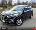 Черный Хендай Туксон, объемом двигателя 2 л и пробегом 123 тыс. км за 15900 $, фото 1 на Automoto.ua