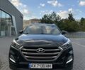 Черный Хендай Туксон, объемом двигателя 2 л и пробегом 147 тыс. км за 20500 $, фото 2 на Automoto.ua