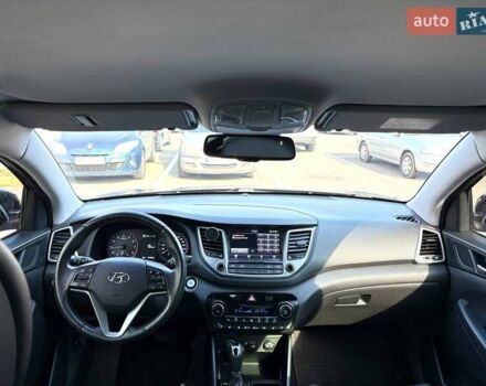 Черный Хендай Туксон, объемом двигателя 2 л и пробегом 98 тыс. км за 24000 $, фото 17 на Automoto.ua