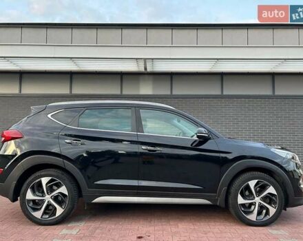 Чорний Хендай Туксон, об'ємом двигуна 1.69 л та пробігом 98 тис. км за 14000 $, фото 5 на Automoto.ua