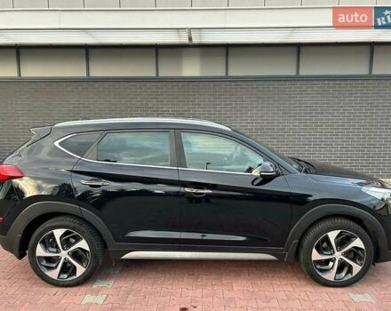 Чорний Хендай Туксон, об'ємом двигуна 1.69 л та пробігом 98 тис. км за 14000 $, фото 7 на Automoto.ua