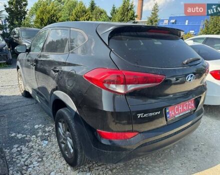 Чорний Хендай Туксон, об'ємом двигуна 2 л та пробігом 119 тис. км за 11700 $, фото 4 на Automoto.ua