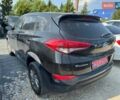 Чорний Хендай Туксон, об'ємом двигуна 2 л та пробігом 119 тис. км за 11700 $, фото 4 на Automoto.ua