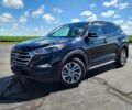 Черный Хендай Туксон, объемом двигателя 2 л и пробегом 70 тыс. км за 12500 $, фото 2 на Automoto.ua