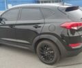 Чорний Хендай Туксон, об'ємом двигуна 2 л та пробігом 143 тис. км за 18000 $, фото 3 на Automoto.ua