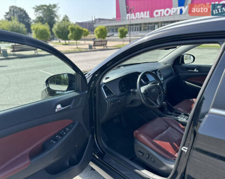 Черный Хендай Туксон, объемом двигателя 2 л и пробегом 158 тыс. км за 22700 $, фото 13 на Automoto.ua