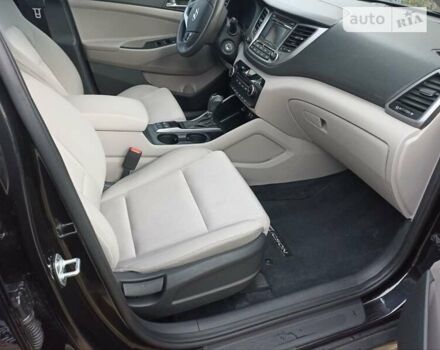 Черный Хендай Туксон, объемом двигателя 2 л и пробегом 107 тыс. км за 14800 $, фото 20 на Automoto.ua