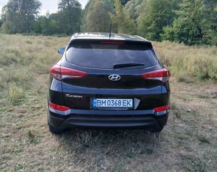 Чорний Хендай Туксон, об'ємом двигуна 2 л та пробігом 148 тис. км за 17800 $, фото 2 на Automoto.ua