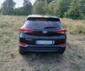 Чорний Хендай Туксон, об'ємом двигуна 2 л та пробігом 148 тис. км за 17800 $, фото 2 на Automoto.ua