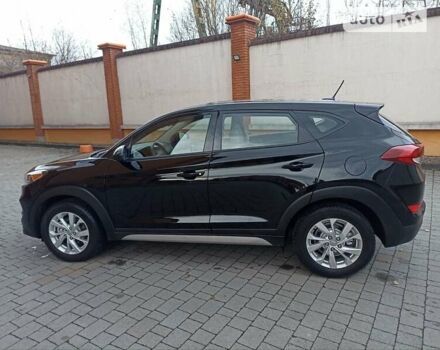 Черный Хендай Туксон, объемом двигателя 2 л и пробегом 107 тыс. км за 14800 $, фото 9 на Automoto.ua