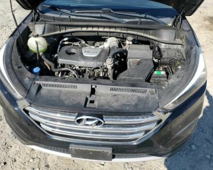 Черный Хендай Туксон, объемом двигателя 1.6 л и пробегом 157 тыс. км за 2600 $, фото 11 на Automoto.ua