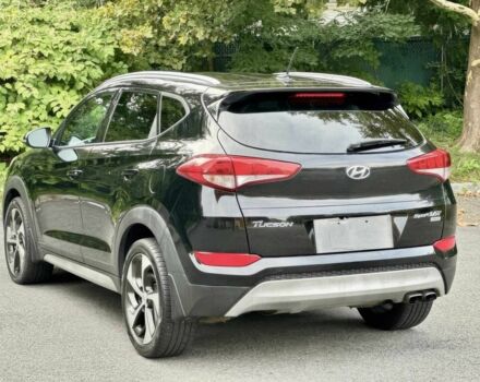 Черный Хендай Туксон, объемом двигателя 1.6 л и пробегом 53 тыс. км за 2950 $, фото 3 на Automoto.ua