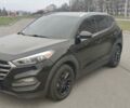 Чорний Хендай Туксон, об'ємом двигуна 2 л та пробігом 143 тис. км за 18000 $, фото 1 на Automoto.ua
