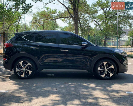 Черный Хендай Туксон, объемом двигателя 2 л и пробегом 122 тыс. км за 19800 $, фото 3 на Automoto.ua