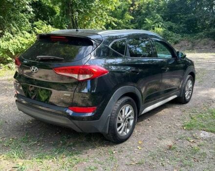 Черный Хендай Туксон, объемом двигателя 2 л и пробегом 83 тыс. км за 4400 $, фото 2 на Automoto.ua