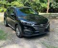 Черный Хендай Туксон, объемом двигателя 2 л и пробегом 83 тыс. км за 4400 $, фото 1 на Automoto.ua