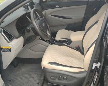 Чорний Хендай Туксон, об'ємом двигуна 2 л та пробігом 143 тис. км за 18000 $, фото 9 на Automoto.ua