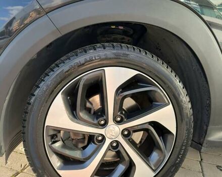 Черный Хендай Туксон, объемом двигателя 2 л и пробегом 120 тыс. км за 21000 $, фото 12 на Automoto.ua